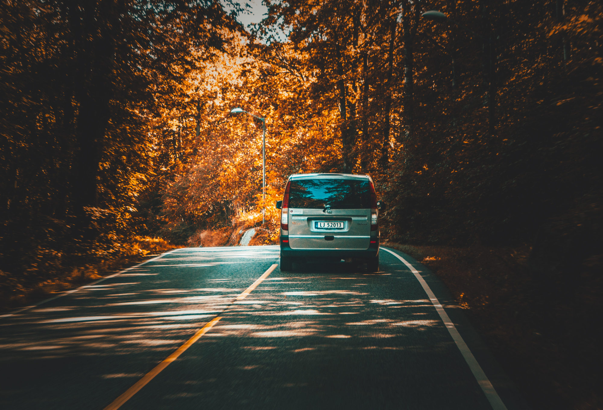 minivan autumn road